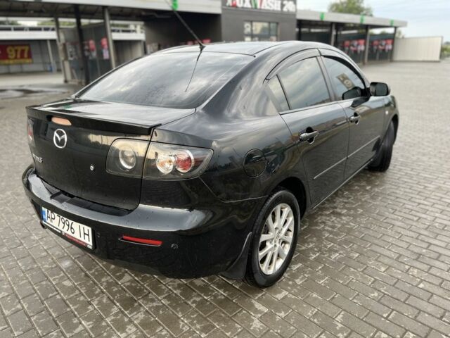 Черный Мазда 3, объемом двигателя 1.6 л и пробегом 211 тыс. км за 5900 $, фото 6 на Automoto.ua
