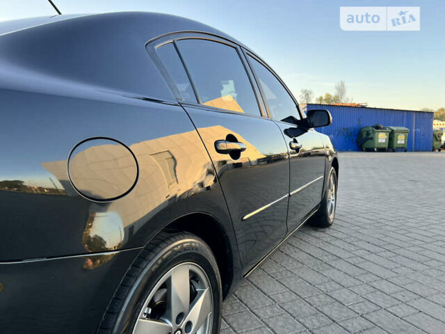 Чорний Мазда 3, об'ємом двигуна 1.6 л та пробігом 183 тис. км за 5600 $, фото 6 на Automoto.ua