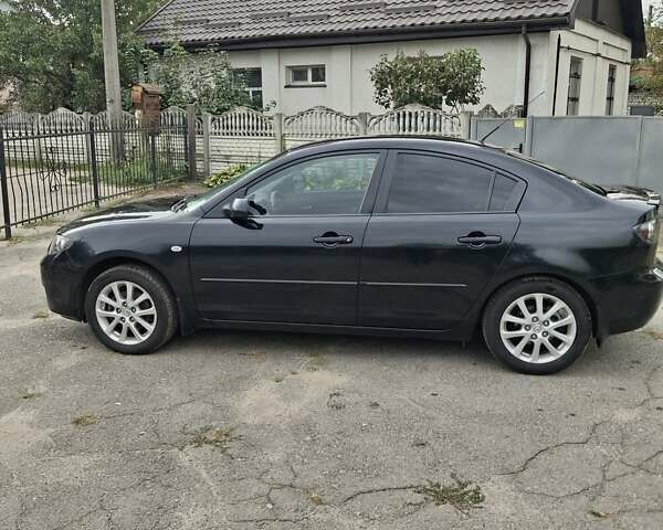 Чорний Мазда 3, об'ємом двигуна 1.6 л та пробігом 208 тис. км за 6600 $, фото 5 на Automoto.ua