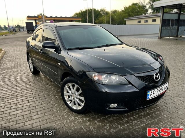 Черный Мазда 3, объемом двигателя 1.6 л и пробегом 212 тыс. км за 6500 $, фото 1 на Automoto.ua