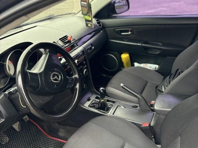 Чорний Мазда 3, об'ємом двигуна 1.6 л та пробігом 330 тис. км за 4150 $, фото 6 на Automoto.ua