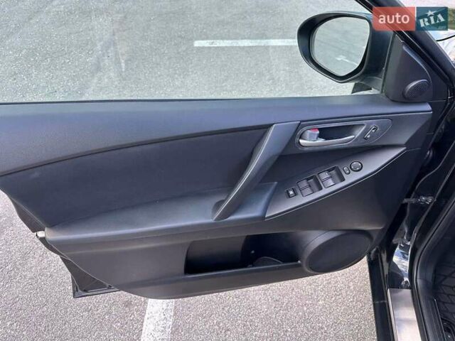 Черный Мазда 3, объемом двигателя 2 л и пробегом 187 тыс. км за 7200 $, фото 15 на Automoto.ua