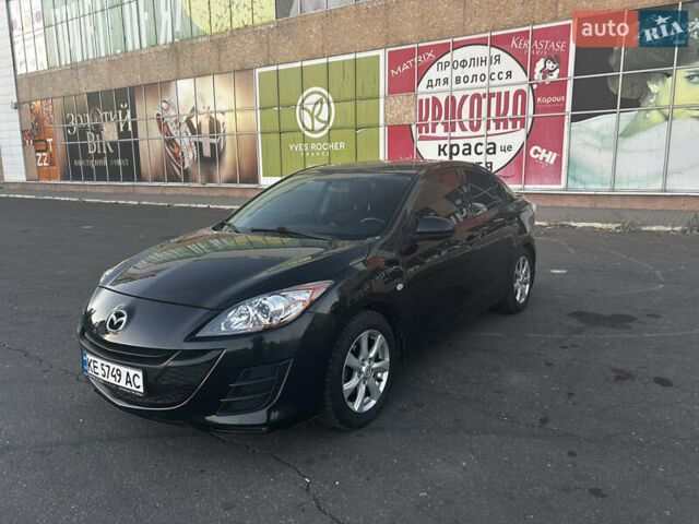 Черный Мазда 3, объемом двигателя 2 л и пробегом 188 тыс. км за 7000 $, фото 1 на Automoto.ua