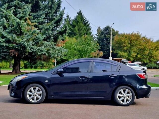 Черный Мазда 3, объемом двигателя 2 л и пробегом 258 тыс. км за 7100 $, фото 6 на Automoto.ua