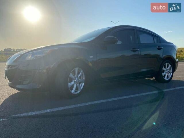 Черный Мазда 3, объемом двигателя 2 л и пробегом 261 тыс. км за 6900 $, фото 3 на Automoto.ua
