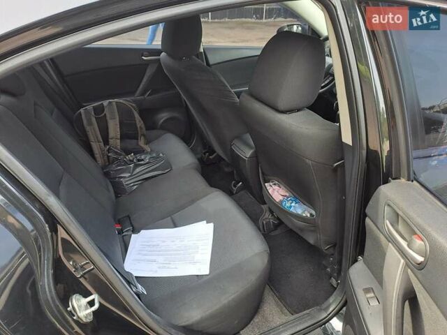 Черный Мазда 3, объемом двигателя 2 л и пробегом 258 тыс. км за 7100 $, фото 14 на Automoto.ua