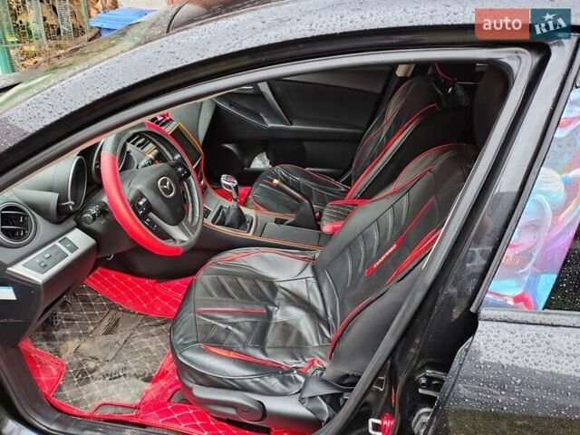 Черный Мазда 3, объемом двигателя 1.6 л и пробегом 213 тыс. км за 7500 $, фото 9 на Automoto.ua