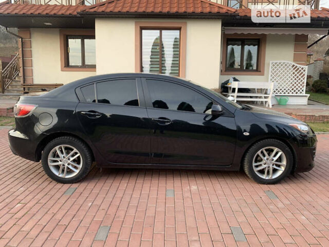 Чорний Мазда 3, об'ємом двигуна 1.6 л та пробігом 209 тис. км за 7500 $, фото 6 на Automoto.ua