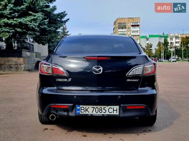 Черный Мазда 3, объемом двигателя 2 л и пробегом 258 тыс. км за 7100 $, фото 1 на Automoto.ua