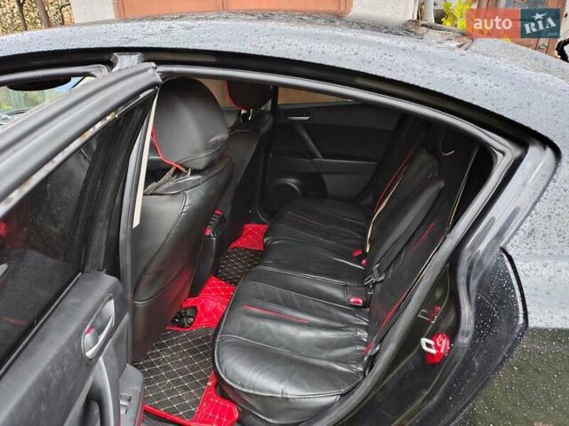 Черный Мазда 3, объемом двигателя 1.6 л и пробегом 213 тыс. км за 7500 $, фото 6 на Automoto.ua