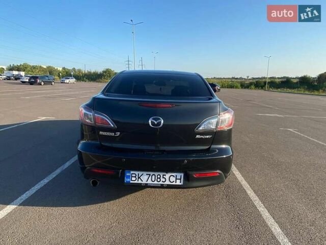 Черный Мазда 3, объемом двигателя 2 л и пробегом 261 тыс. км за 6900 $, фото 7 на Automoto.ua