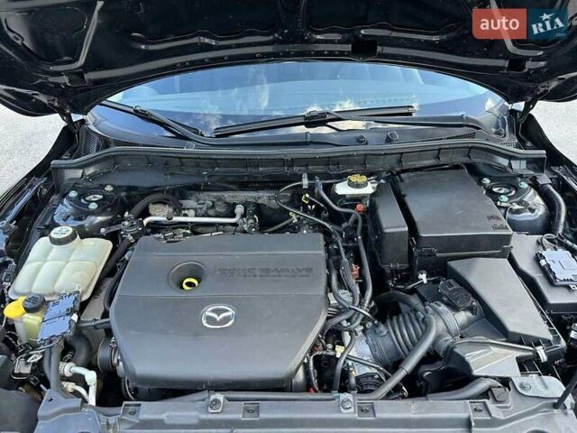 Черный Мазда 3, объемом двигателя 2 л и пробегом 187 тыс. км за 7200 $, фото 30 на Automoto.ua