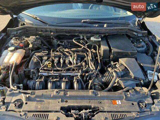 Черный Мазда 3, объемом двигателя 2 л и пробегом 261 тыс. км за 6900 $, фото 21 на Automoto.ua