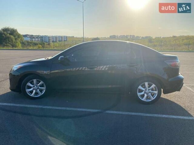 Черный Мазда 3, объемом двигателя 2 л и пробегом 261 тыс. км за 6900 $, фото 4 на Automoto.ua