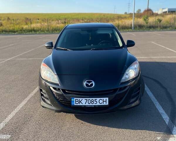 Черный Мазда 3, объемом двигателя 2 л и пробегом 261 тыс. км за 6900 $, фото 1 на Automoto.ua