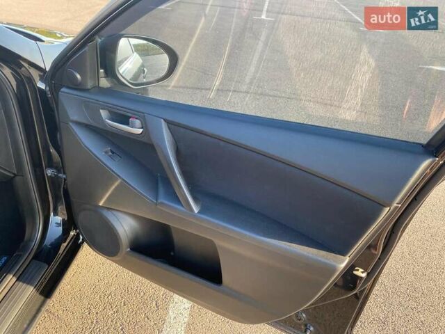Черный Мазда 3, объемом двигателя 2 л и пробегом 261 тыс. км за 6900 $, фото 15 на Automoto.ua