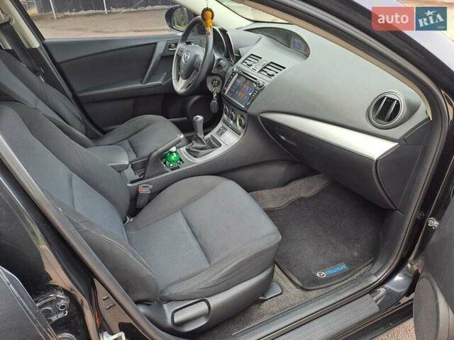Черный Мазда 3, объемом двигателя 2 л и пробегом 258 тыс. км за 7100 $, фото 13 на Automoto.ua