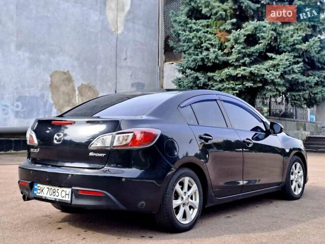 Черный Мазда 3, объемом двигателя 2 л и пробегом 258 тыс. км за 7100 $, фото 9 на Automoto.ua