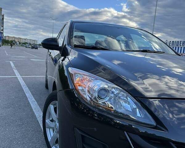 Черный Мазда 3, объемом двигателя 2 л и пробегом 187 тыс. км за 7200 $, фото 12 на Automoto.ua