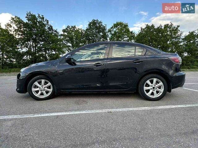Черный Мазда 3, объемом двигателя 2 л и пробегом 187 тыс. км за 7200 $, фото 4 на Automoto.ua