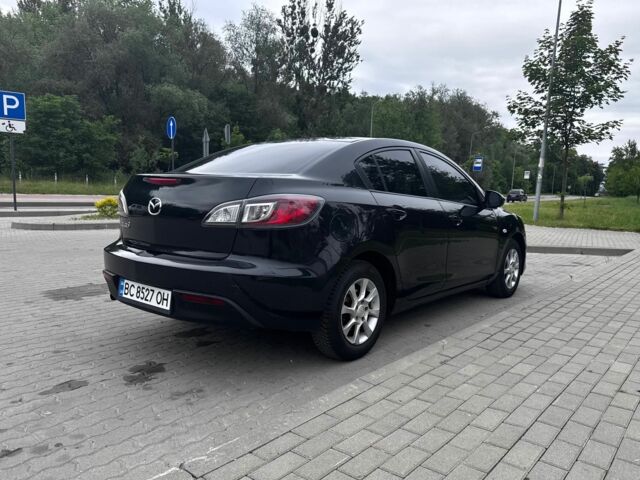 Чорний Мазда 3, об'ємом двигуна 1.6 л та пробігом 183 тис. км за 6312 $, фото 4 на Automoto.ua