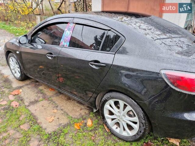 Черный Мазда 3, объемом двигателя 1.6 л и пробегом 213 тыс. км за 7500 $, фото 2 на Automoto.ua