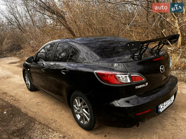 Чорний Мазда 3, об'ємом двигуна 1.6 л та пробігом 245 тис. км за 6800 $, фото 5 на Automoto.ua