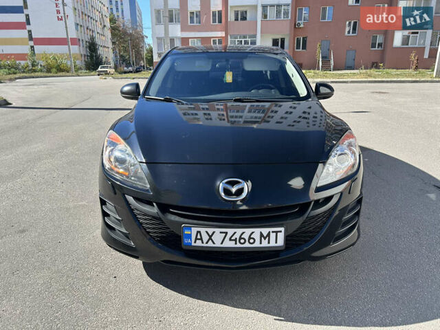 Черный Мазда 3, объемом двигателя 1.6 л и пробегом 185 тыс. км за 7600 $, фото 1 на Automoto.ua