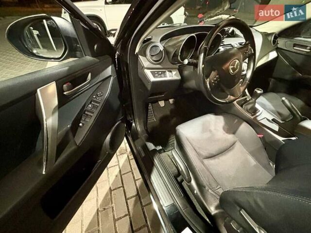 Черный Мазда 3, объемом двигателя 1.6 л и пробегом 199 тыс. км за 7500 $, фото 13 на Automoto.ua