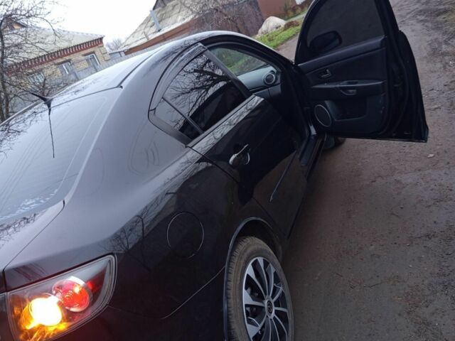 Черный Мазда 3, объемом двигателя 1.6 л и пробегом 160 тыс. км за 5500 $, фото 7 на Automoto.ua