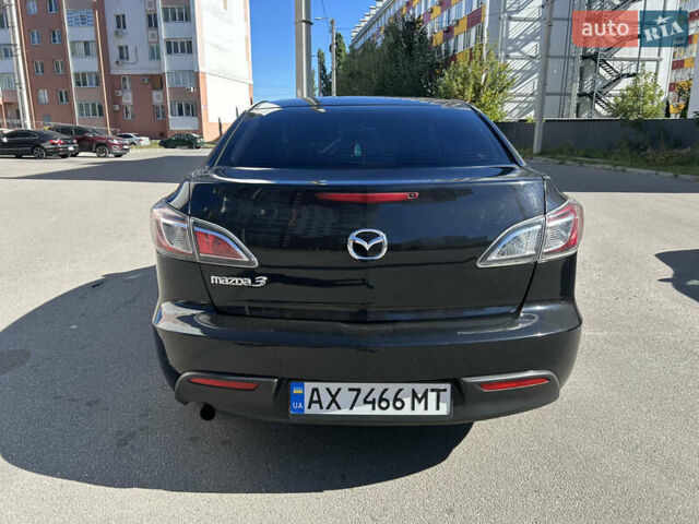 Черный Мазда 3, объемом двигателя 1.6 л и пробегом 185 тыс. км за 7600 $, фото 2 на Automoto.ua