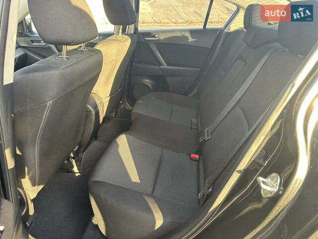 Чорний Мазда 3, об'ємом двигуна 1.6 л та пробігом 188 тис. км за 7400 $, фото 13 на Automoto.ua