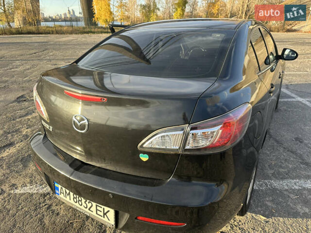 Чорний Мазда 3, об'ємом двигуна 1.6 л та пробігом 188 тис. км за 7400 $, фото 8 на Automoto.ua