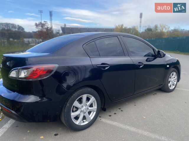 Чорний Мазда 3, об'ємом двигуна 1.6 л та пробігом 256 тис. км за 6999 $, фото 7 на Automoto.ua