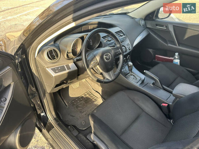 Чорний Мазда 3, об'ємом двигуна 1.6 л та пробігом 188 тис. км за 7400 $, фото 4 на Automoto.ua