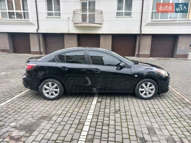 Черный Мазда 3, объемом двигателя 1.6 л и пробегом 257 тыс. км за 7850 $, фото 10 на Automoto.ua