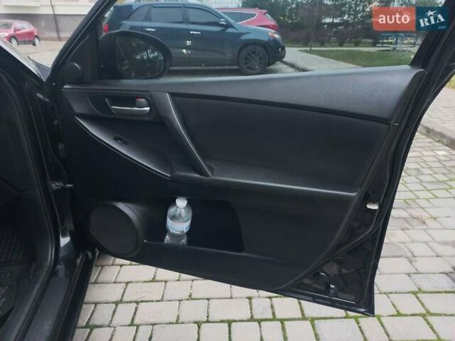 Черный Мазда 3, объемом двигателя 1.6 л и пробегом 257 тыс. км за 7850 $, фото 28 на Automoto.ua
