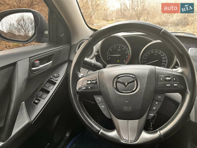 Чорний Мазда 3, об'ємом двигуна 1.6 л та пробігом 245 тис. км за 6800 $, фото 15 на Automoto.ua