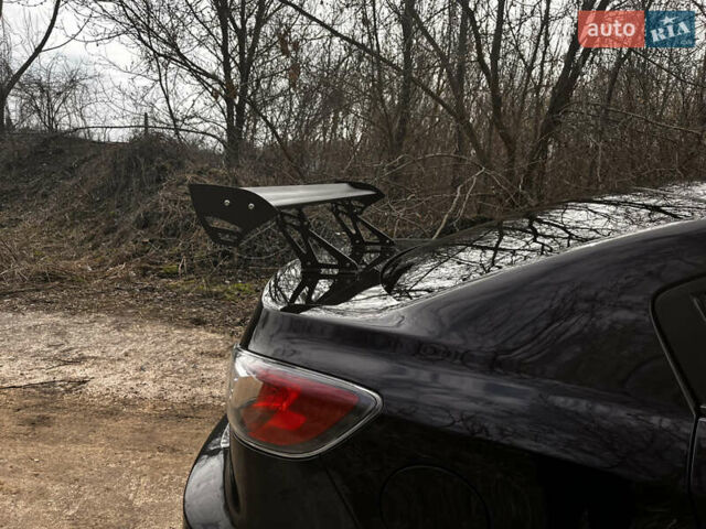 Чорний Мазда 3, об'ємом двигуна 1.6 л та пробігом 245 тис. км за 6800 $, фото 10 на Automoto.ua