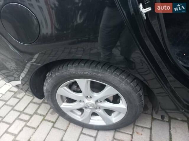 Черный Мазда 3, объемом двигателя 1.6 л и пробегом 257 тыс. км за 7850 $, фото 26 на Automoto.ua