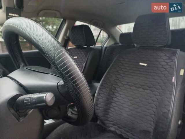 Черный Мазда 3, объемом двигателя 1.6 л и пробегом 257 тыс. км за 7850 $, фото 23 на Automoto.ua