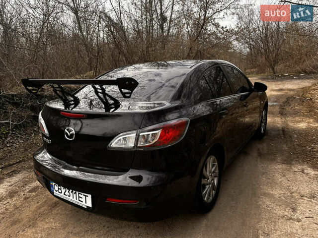 Чорний Мазда 3, об'ємом двигуна 1.6 л та пробігом 245 тис. км за 6800 $, фото 7 на Automoto.ua