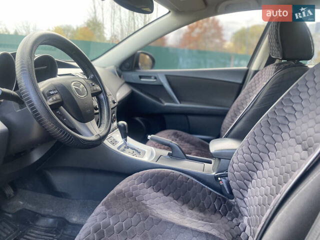 Черный Мазда 3, объемом двигателя 1.6 л и пробегом 255 тыс. км за 7850 $, фото 21 на Automoto.ua