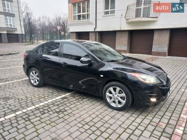 Черный Мазда 3, объемом двигателя 1.6 л и пробегом 257 тыс. км за 7850 $, фото 11 на Automoto.ua