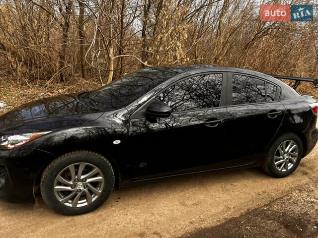 Чорний Мазда 3, об'ємом двигуна 1.6 л та пробігом 245 тис. км за 6800 $, фото 9 на Automoto.ua