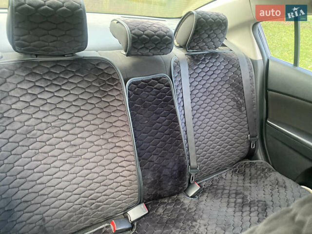 Чорний Мазда 3, об'ємом двигуна 1.6 л та пробігом 256 тис. км за 6999 $, фото 28 на Automoto.ua