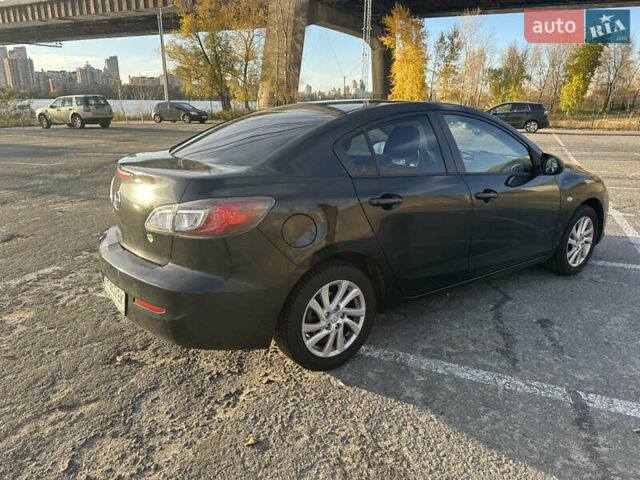 Чорний Мазда 3, об'ємом двигуна 1.6 л та пробігом 188 тис. км за 7400 $, фото 12 на Automoto.ua