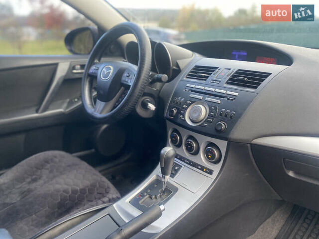 Чорний Мазда 3, об'ємом двигуна 1.6 л та пробігом 256 тис. км за 6999 $, фото 26 на Automoto.ua