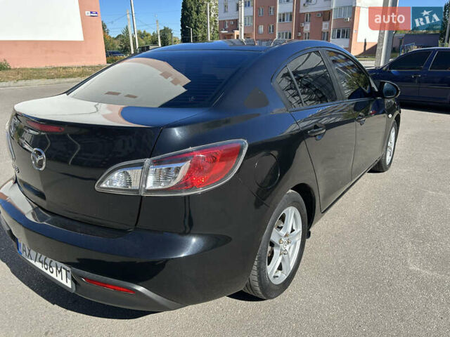 Черный Мазда 3, объемом двигателя 1.6 л и пробегом 185 тыс. км за 7600 $, фото 5 на Automoto.ua