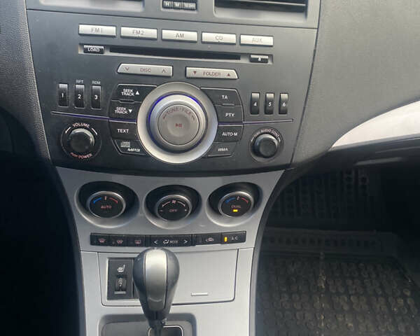 Чорний Мазда 3, об'ємом двигуна 1.6 л та пробігом 256 тис. км за 6999 $, фото 23 на Automoto.ua